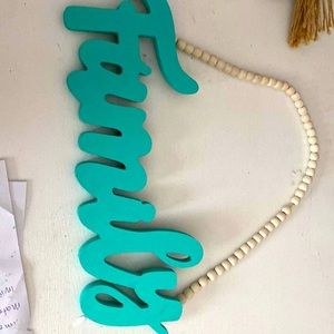 Family sign’s turquoise hanging beads